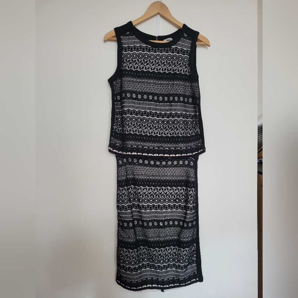 2 piece set. Sleeveless top and pencil skit set. Size M/8.